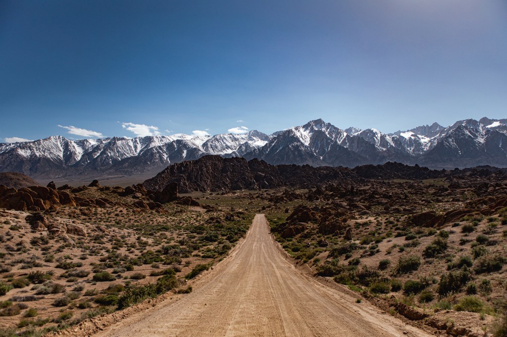 View of snow on top of the Eastern Sierra mountains from Alabama Hills outside of Lone Pine on May 11, 2023. Photo by Larry Valenzuela, CalMatters/CatchLight Local